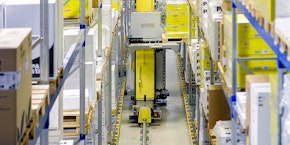 roll of sheet steel, transported by crane at the factory roll of sheet steel, transported by crane at the factory