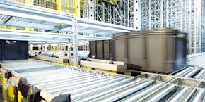 roll of sheet steel, transported by crane at the factory roll of sheet steel, transported by crane at the factory