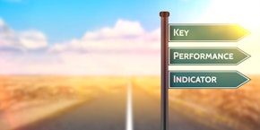 roll of sheet steel, transported by crane at the factory