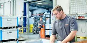 roll of sheet steel, transported by crane at the factory roll of sheet steel, transported by crane at the factory